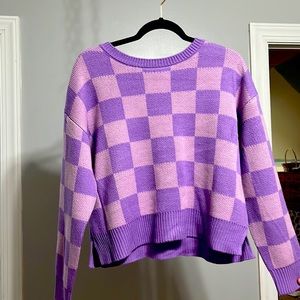 Checkered, pink, and purple sweater